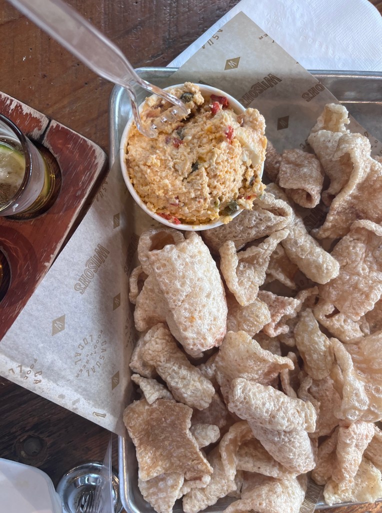 tray of pork skins with pimento cheese spread
